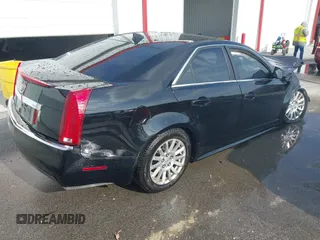 2011 Cadillac CTS with VIN 1G6DC5EY7B0118590, listed as a IAAI auction lot 41003246 with Not provided miles and . Bid and sale history available at DreamBid. Image 4.