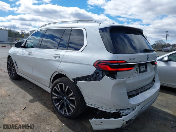 2023 BMW X7 xDrive40i with VIN 5UX23EM05P9R02428, listed as a IAAI auction lot 41695731 with 34,287 mi miles. Bid and sale history available at carsss.com. Image 3.