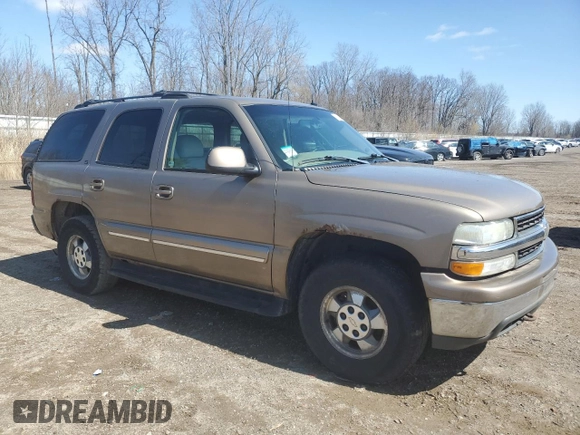 2003 Chevrolet Tahoe LT z VIN 1GNEK13Z43J136234, wystawiony jako Copart lot #51245445 z przebiegiem 227 769 mil mil oraz Czysty tytuł • Clean title. Historia ofert i sprzedaży dostępna na DreamBid. Obrazek 4.