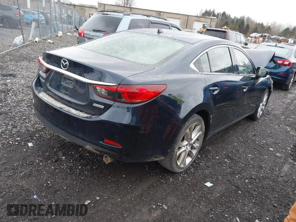 2017 Mazda Mazda6 Touring with VIN JM1GL1V59H1154440, listed as a IAAI auction lot 41078595 with 104,732 mi miles. Bid and sale history available at carsss.com. Image 4.