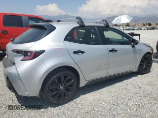 2022 Toyota Corolla Hatchback SE with VIN JTND4MBE2N3180993, listed as a Copart auction lot 64521414 with 15,393 mi miles and Salvage Title. Bid and sale history available at carsss.com. Image 3.