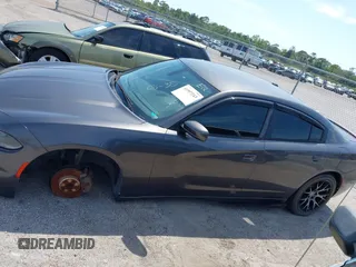 2015 Dodge Charger SE z VIN 2C3CDXBGXFH751491, wystawiony jako IAAI lot #41907243 z przebiegiem 112 545 mil mil oraz . Historia ofert i sprzedaży dostępna na DreamBid. Obrazek 14.