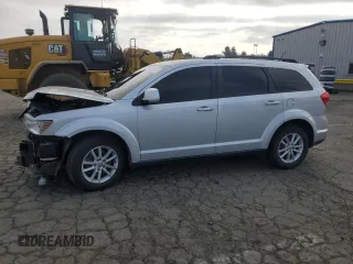 2014 Dodge Journey SXT with VIN 3C4PDCBG5ET227189, listed as a Copart auction lot 88994355 with 166,989 mi miles and Salvage Title. Bid and sale history available at carsss.com. Image 1.