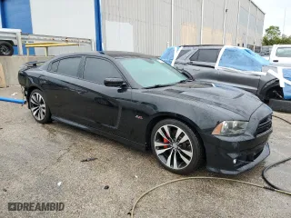 2012 Dodge Charger SRT8 with VIN 2C3CDXEJ8CH217246, listed as a Copart auction lot 71079334 with 105,528 mi miles and Salvage Title. Bid and sale history available at carsss.com. Image 4.