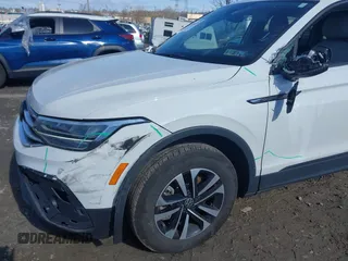 2024 Volkswagen Tiguan S with VIN 3VVFB7AX7RM063715, listed as a IAAI auction lot 41974650 with 23,374 mi miles and . Bid and sale history available at DreamBid. Image 6.