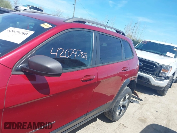 2016 Jeep Cherokee Trailhawk with VIN 1C4PJMBS9GW237059, listed as a IAAI auction lot 42079788 with 114,513 mi miles. Bid and sale history available at carsss.com. Image 15.