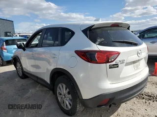 2015 Mazda CX-5 Touring with VIN JM3KE4CY7F0553862, listed as a Copart auction lot 48392725 with 122,530 mi miles and Salvage Title. Bid and sale history available at carsss.com. Image 2.