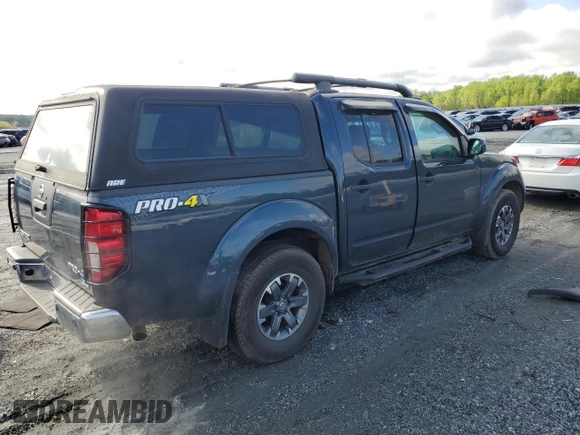 2018 Nissan Frontier Pro-4X with VIN 1N6DD0EV5JN702214, listed as a Copart auction lot 52802715 with 79,837 mi miles and Salvage title. Bid and sale history available at DreamBid. Image 3.