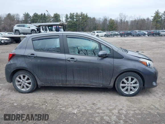 2015 Toyota Yaris L with VIN VNKKTUD33FA036237, listed as a IAAI auction lot 41710224 with 77,394 mi miles. Bid and sale history available at carsss.com. Image 13.