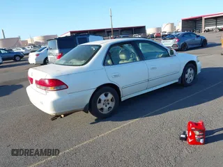 2002 Honda Accord EX z VIN 1HGCG16522A024557, wystawiony jako IAAI lot #41525344 z przebiegiem 219 786 mil mil oraz . Historia ofert i sprzedaży dostępna na DreamBid. Obrazek 4.