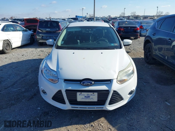 2012 Ford Focus SE z VIN 1FAHP3K29CL265135, wystawiony jako IAAI lot #40989480 z przebiegiem 158 742 mil mil oraz . Historia ofert i sprzedaży dostępna na DreamBid. Obrazek 12.