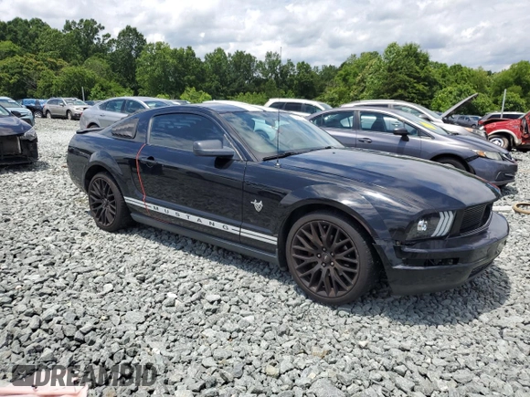 2009 Ford Mustang z VIN 1ZVHT80N295128967, wystawiony jako Copart lot #59182115 z przebiegiem 91 119 mil mil oraz Szkoda całkowita • Salvage title. Historia ofert i sprzedaży dostępna na DreamBid. Obrazek 4.