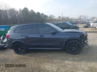 2020 BMW X5 sDrive40i with VIN 5UXCR4C06LLW64438, listed as a IAAI auction lot 41520407 with 89,868 mi miles and . Bid and sale history available at DreamBid. Image 14.