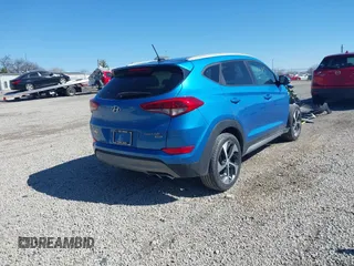 2017 Hyundai Tucson Sport with VIN KM8J3CA20HU336809, listed as a IAAI auction lot 41800913 with 112,948 mi miles and . Bid and sale history available at DreamBid. Image 4.