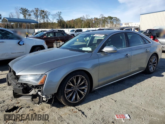 2013 Audi A8 3.0L with VIN WAUAGAFD6DN012546, listed as a Copart auction lot 82210024 with 121,004 mi miles and Clean title. Bid and sale history available at DreamBid. Image 1.