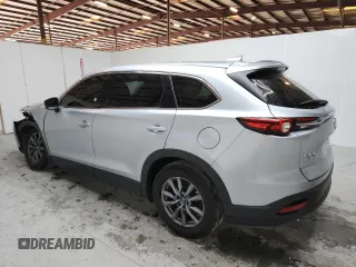 2023 Mazda CX-9 Touring with VIN JM3TCBCY9P0656636, listed as a Copart auction lot 64243905 with 59,788 mi miles and Non repairable. Bid and sale history available at DreamBid. Image 2.