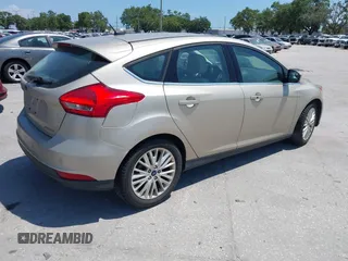 2017 Ford Focus Titanium с VIN 1FADP3N21HL327581, выставлен на аукционе IAAI как лот 42342179 с пробегом 61 489 миль миль и . История ставок и продаж доступна на DreamBid. Изображение 4.