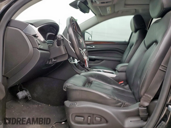 2016 Cadillac SRX Luxury Collection with VIN 3GYFNBE33GS513010, listed as a Copart auction lot 53452665 with 83,811 mi miles and Salvage title. Bid and sale history available at DreamBid. Image 7.