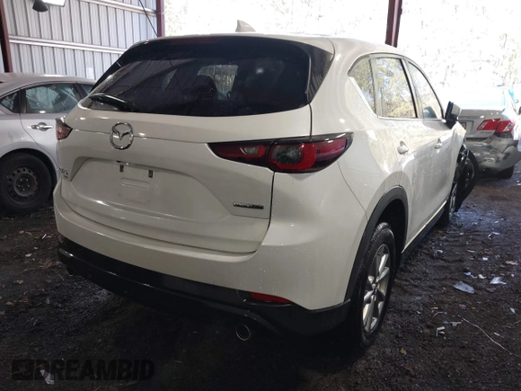 2023 Mazda CX-5 2.5 S Carbon Edition with VIN JM3KFBCM7P0192553, listed as a IAAI auction lot 41893002 with 54,121 mi miles. Bid and sale history available at carsss.com. Image 4.