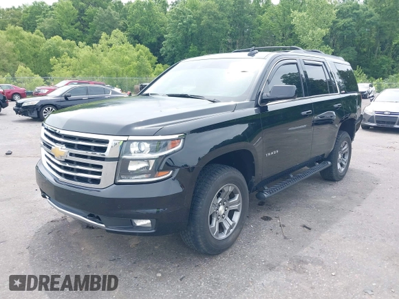 2017 Chevrolet Tahoe LT z VIN 1GNSKBKC8HR311969, wystawiony jako IAAI lot #42126414 z przebiegiem 160 994 mil mil oraz . Historia ofert i sprzedaży dostępna na DreamBid. Obrazek 19.