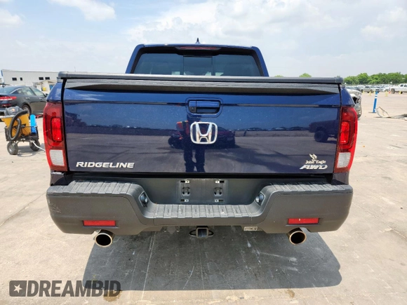 2023 Honda Ridgeline RTL with VIN 5FPYK3F50PB011150, listed as a Copart auction lot 58273325 with 38,742 mi miles and Salvage title. Bid and sale history available at DreamBid. Image 6.