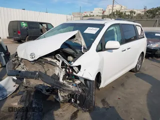 2014 Toyota Sienna SE with VIN 5TDXK3DC2ES472249, listed as a IAAI auction lot 41402101 with Not Provided miles and . Bid and sale history available at DreamBid. Image 16.