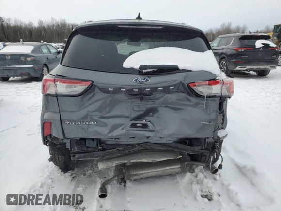 2021 Ford Escape Titanium Hybrid с VIN 1FMCU9DZ6MUA77030, выставлен на аукционе Copart как лот 41830245 с пробегом 83 474 миль миль и Списание • Salvage title. История ставок и продаж доступна на DreamBid. Изображение 6.