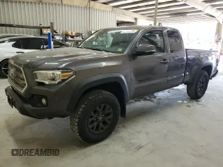 2017 Toyota Tacoma SR5 with VIN 5TFSZ5AN5HX093297, listed as a Copart auction lot 62146505 with 105,037 mi miles and Salvage title. Bid and sale history available at DreamBid. Image 1.