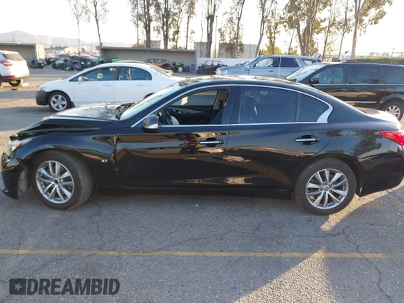 2015 Infiniti Q50 Premium z VIN JN1BV7AP5FM346323, wystawiony jako IAAI lot #41305093 z przebiegiem 112 556 mil mil oraz . Historia ofert i sprzedaży dostępna na DreamBid. Obrazek 14.