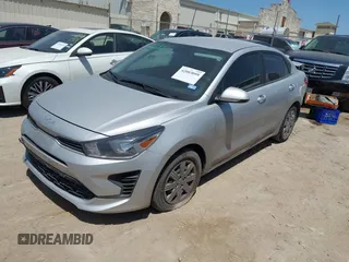 2023 Kia Rio S z VIN 3KPA24AD6PE600384, wystawiony jako IAAI lot #42003099 z przebiegiem 27 001 mil mil oraz . Historia ofert i sprzedaży dostępna na DreamBid. Obrazek 17.