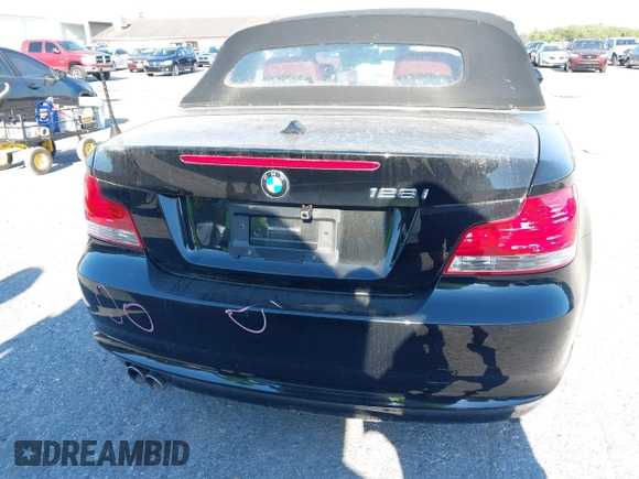 2011 BMW 1 Series 128i with VIN WBAUL7C55BVM81049, listed as a IAAI auction lot 41892811 with 50,659 mi miles and . Bid and sale history available at carsss.com. Image 17.