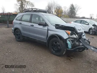2009 Honda CR-V LX with VIN 5J6RE48339L016522, listed as a IAAI auction lot 40783609 with 209,891 mi miles. Bid and sale history available at carsss.com. Image 1.