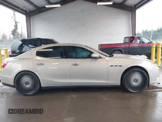 2017 Maserati Ghibli with VIN ZAM57XSLXH1238134, listed as a IAAI auction lot 41871754 with 34,776 mi miles. Bid and sale history available at carsss.com. Image 12.