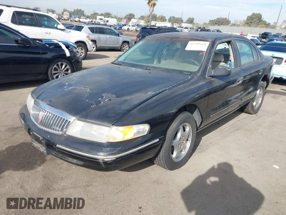 1997 Lincoln Continental with VIN 1LNLM97V5VY665410, listed as a IAAI auction lot 41239128 with 66,873 mi miles. Bid and sale history available at carsss.com. Image 18.