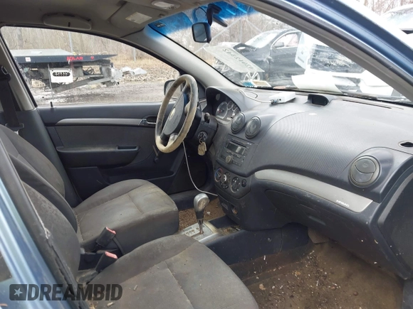 2007 Chevrolet Aveo LS with VIN KL1TD56667B175174, listed as a IAAI auction lot 42012342 with 100,534 mi miles and . Bid and sale history available at DreamBid. Image 5.