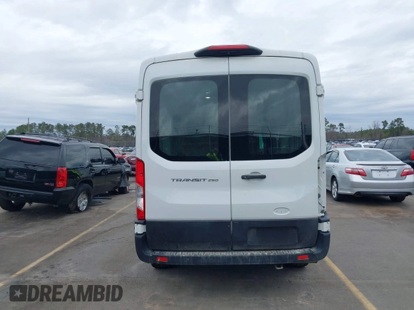 2021 Ford Transit Cargo with VIN 1FTBR1C85MKA12810, listed as a IAAI auction lot 41610132 with 105,724 mi miles and . Bid and sale history available at DreamBid. Image 16.