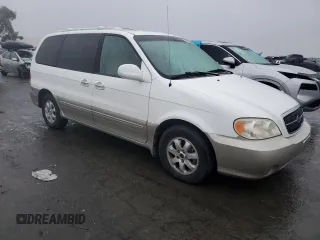 2005 Kia Sedona LX with VIN KNDUP132356753784, listed as a Copart auction lot 85112374 with 169,123 mi miles and Salvage Title. Bid and sale history available at carsss.com. Image 4.