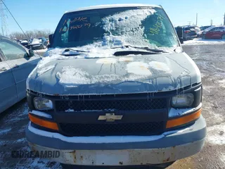 2007 Chevrolet Express Cargo Van with VIN 1GCGG25VX71126543, listed as a IAAI auction lot 41642079 with 97,859 mi miles. Bid and sale history available at carsss.com. Image 6.
