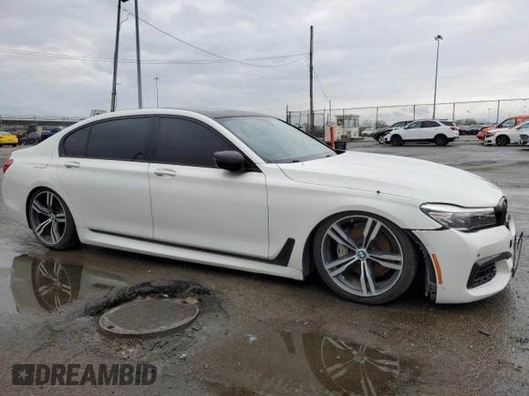 2017 BMW 7 Series 740i with VIN WBA7E2C3XHG741242, listed as a Copart auction lot 51577125 with 101,429 mi miles and Clean Title. Bid and sale history available at carsss.com. Image 4.