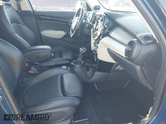2016 MINI Cooper Hardtop 4 Door S with VIN WMWXU3C54G2D30766, listed as a IAAI auction lot 42008026 with 101,898 mi miles. Bid and sale history available at carsss.com. Image 5.