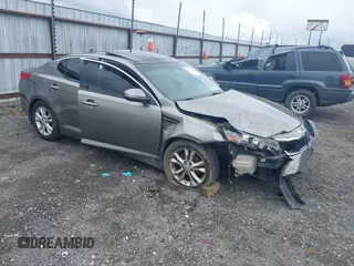 2013 Kia Optima EX with VIN 5XXGN4A78DG196728, listed as a IAAI auction lot 42242303 with 164,448 mi miles and . Bid and sale history available at DreamBid. Image 1.