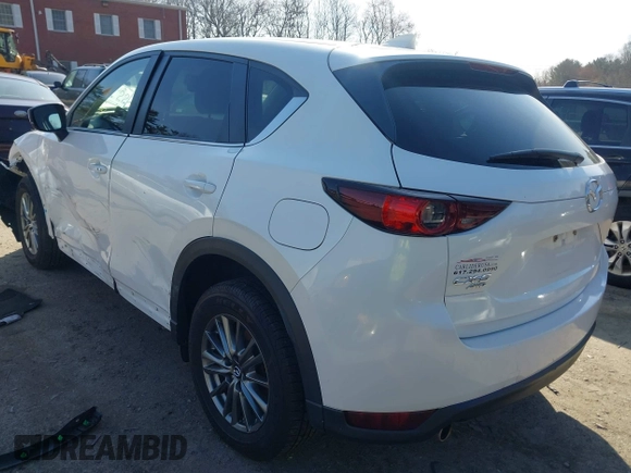 2017 Mazda CX-5 Touring z VIN JM3KFBCL8H0214052, wystawiony jako IAAI lot #41940783 z przebiegiem 120 083 mil mil oraz . Historia ofert i sprzedaży dostępna na DreamBid. Obrazek 3.