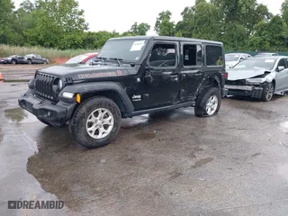 2021 Jeep Wrangler Unlimited Willys with VIN 1C4HJXDMXMW589213, listed as a IAAI auction lot 40018652 with 42,247 mi miles. Bid and sale history available at carsss.com. Image 21.