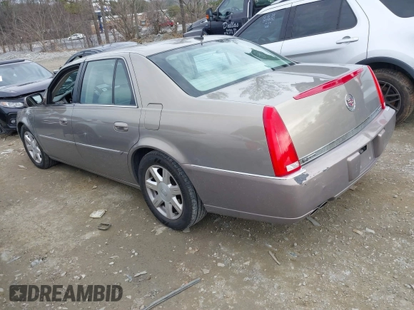 2007 Cadillac DTS Luxury I z VIN 1G6KD57Y97U168196, wystawiony jako IAAI lot #41463856 z przebiegiem 167 875 mil mil oraz . Historia ofert i sprzedaży dostępna na DreamBid. Obrazek 3.