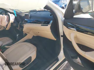 2018 BMW X1 sDrive28i with VIN WBXHU7C36J5H41267, listed as a IAAI auction lot 41270207 with 84,726 mi miles. Bid and sale history available at carsss.com. Image 5.