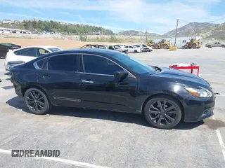 2017 Nissan Altima S z VIN 1N4AL3AP9HC173928, wystawiony jako IAAI lot #41884621 z przebiegiem 73 217 mil mil oraz . Historia ofert i sprzedaży dostępna na DreamBid. Obrazek 14.