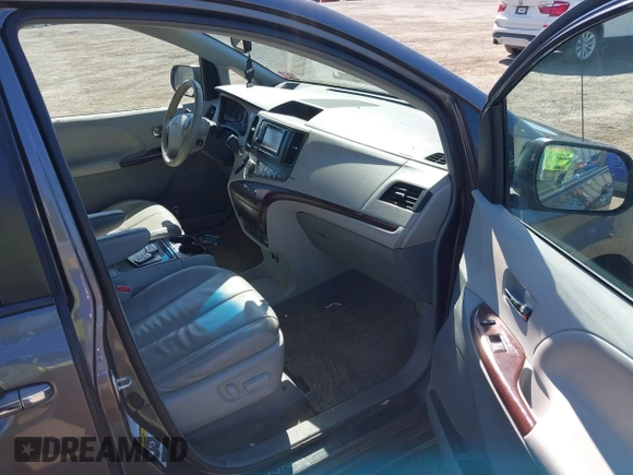 2013 Toyota Sienna XLE with VIN 5TDDK3DC6DS067612, listed as a IAAI auction lot 41756287 with 142,707 mi miles and . Bid and sale history available at DreamBid. Image 5.