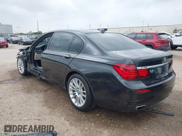 2014 BMW 7 Series ALPINA B7 z VIN WBAYE8C57ED134799, wystawiony jako IAAI lot #41891633 z przebiegiem 96 411 mil mil oraz . Historia ofert i sprzedaży dostępna na DreamBid. Obrazek 3.