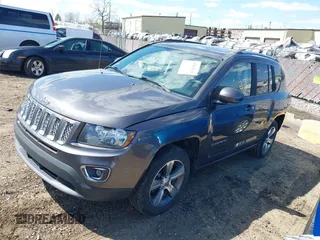 2016 Jeep Compass High Altitude Edition with VIN 1C4NJCEA3GD760934, listed as a IAAI auction lot 42028621 with 102,498 mi miles. Bid and sale history available at carsss.com. Image 2.