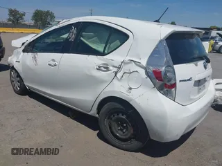 2013 Toyota Prius One z VIN JTDKDTB39D1533017, wystawiony jako IAAI lot #42383282 z przebiegiem 162 435 mil mil oraz . Historia ofert i sprzedaży dostępna na DreamBid. Obrazek 3.